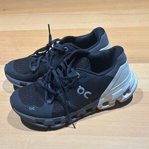 On Running Black and White Sneakers